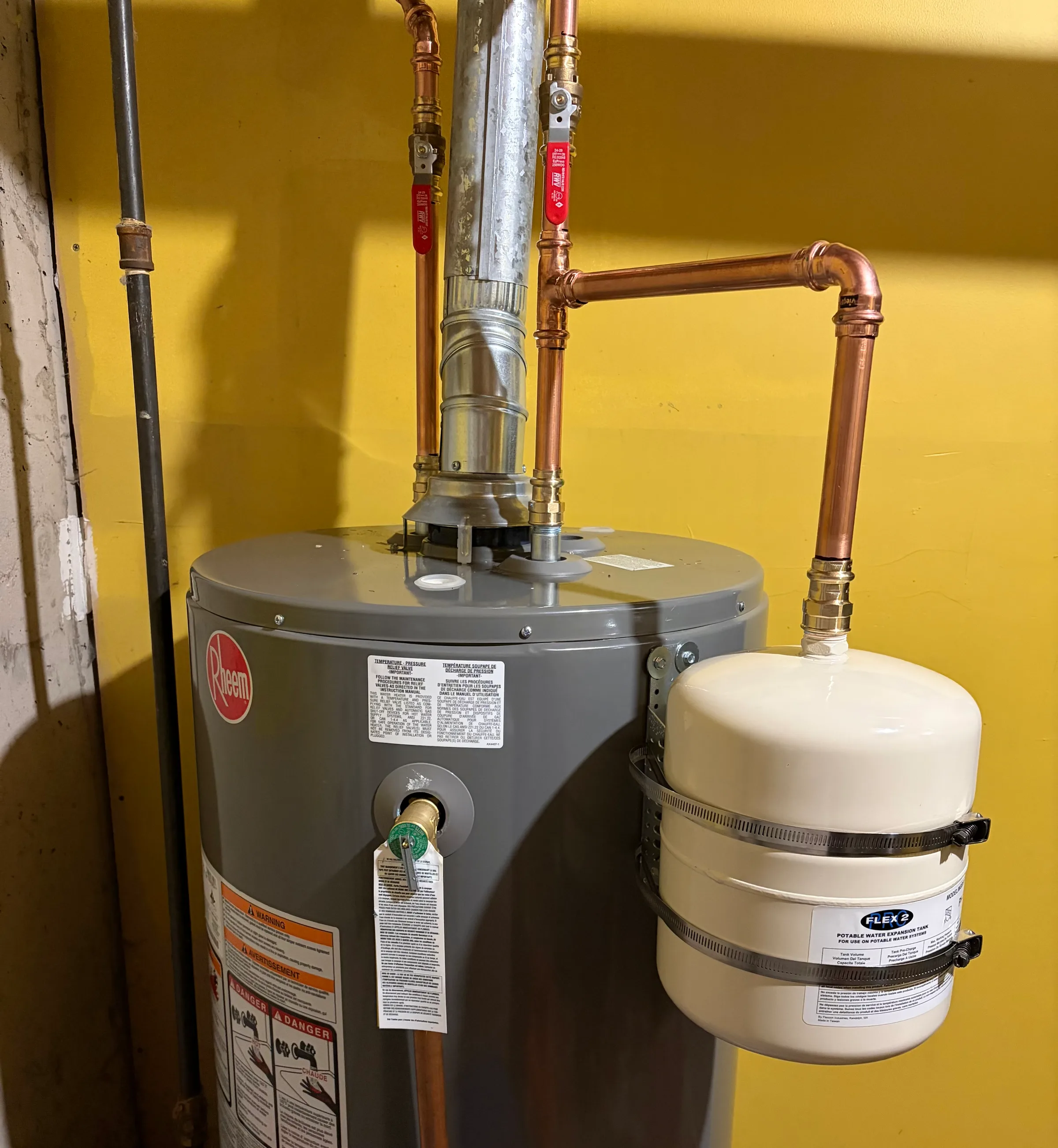 Rheem water heater with potable water expansion tank installed by First Class Mechanical